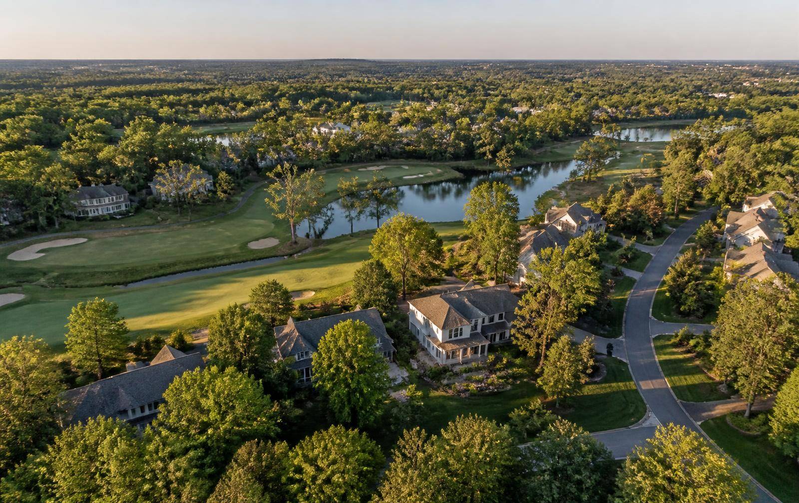 Aerial view of estate homes and fairways in the Ballantyne golf community